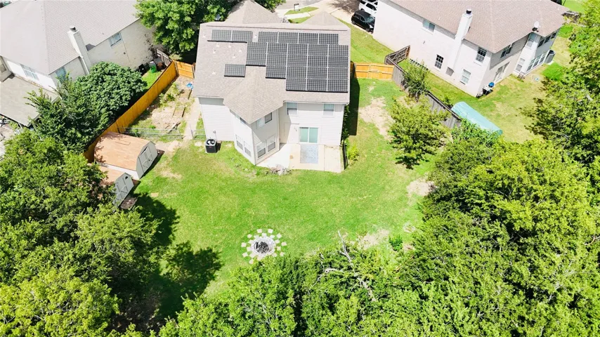 Look at how wooded the area behind the fence is...offering you fantastic privacy!