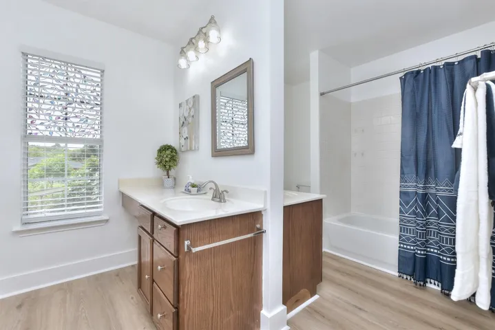 The primary bath features fresh flooring, back-2-back dual vanities, tub/shower combination, linen closet and huge walk-in closet! 