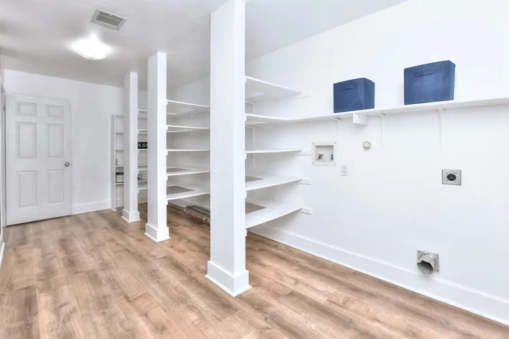 This enormous pantry and utility room combination is perfectly situated between the garage and kitchen 