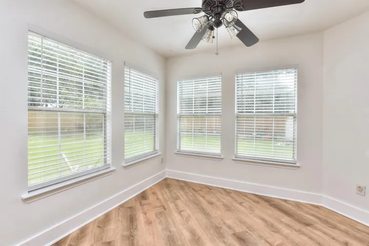 Great breakfast/dining area off the kitchen overlooks the big back yard!
