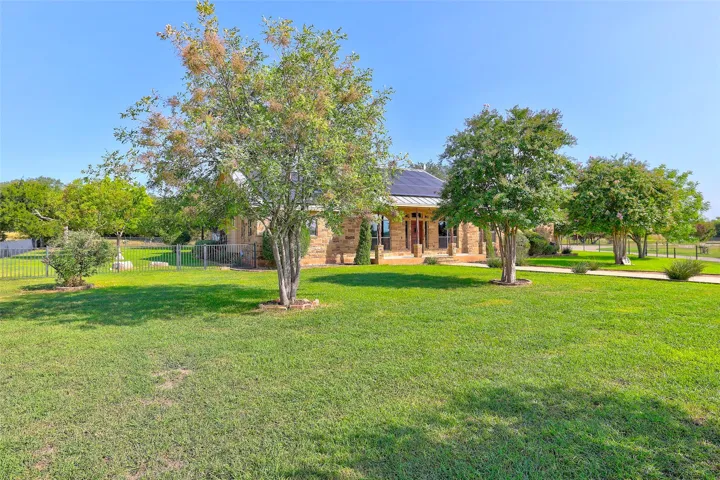 This home features a solar power system that can reduce your energy bills to little or nothing—often just pennies a month and a Generac Whole Home Generator