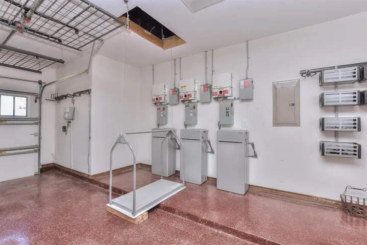 This photo shows the auto power lift for attic storage