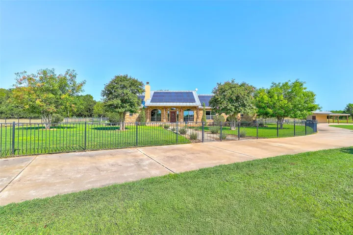This home features a solar power system that can reduce your energy bills to little or nothing—often just pennies a month and a Generac Whole Home Generator