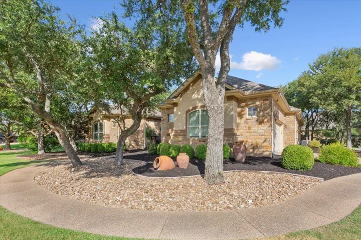 View of front of house featuring stone siding