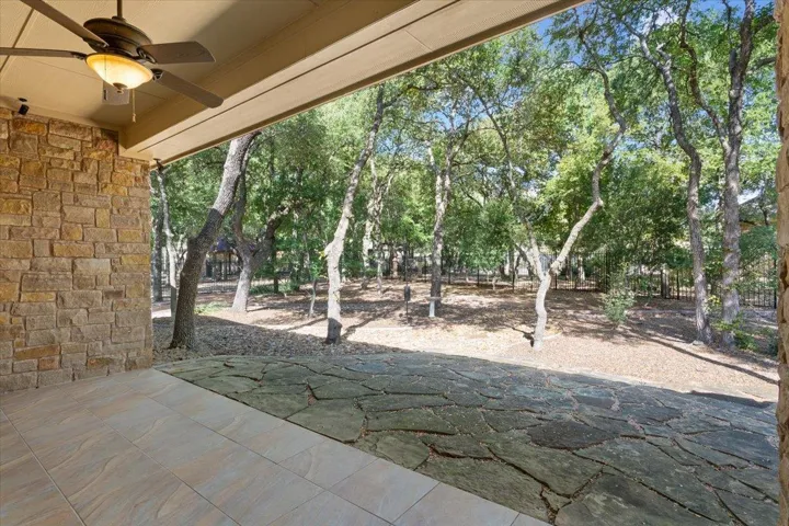 View of patio featuring ceiling fan