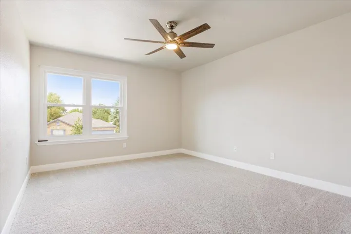 Bedroom with a ceiling fan