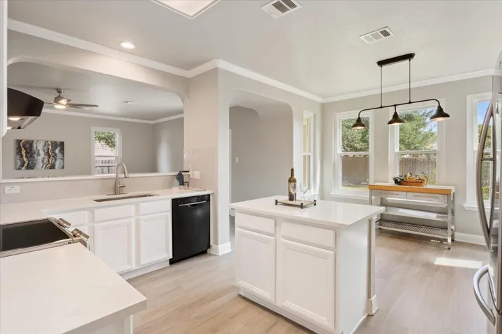 Kitchen featuring pendant lighting