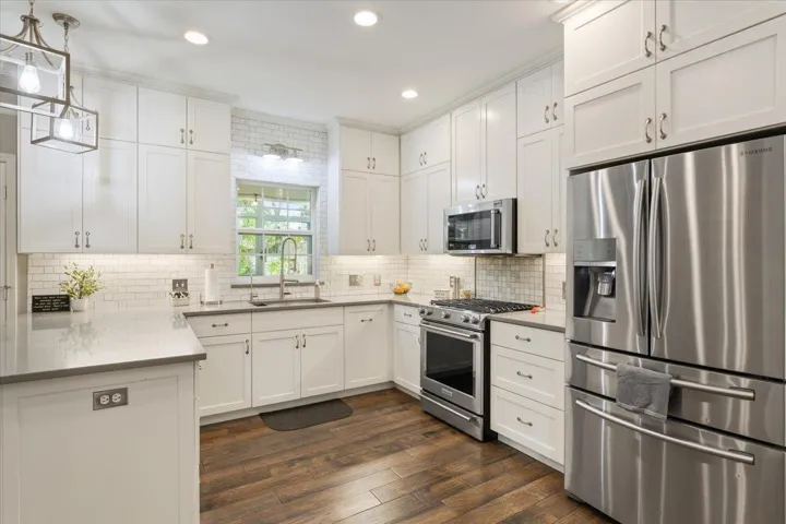 The kitchen was completely remodeled by the current owners with all new cabinets, appliances, counter tops, etc...