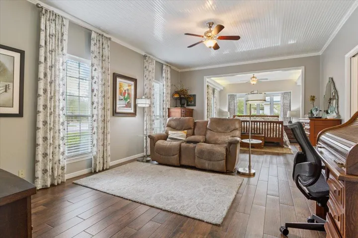 You probably haven't seen a primary suite like this .one.  As you walk into the room, there is a private living area where the current owners watch tv, read a book, or just chat at the end of the day...