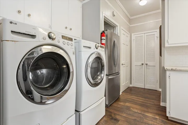 You also have room in the laundry room for an extra refrigerator or freezer.  The storage in this house is unbelieveable.  The door in the center opens to an additional pantry...