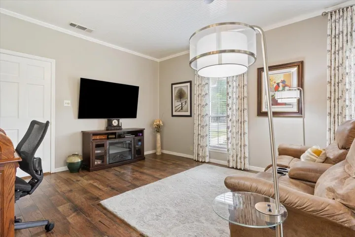 Another view of the "living area" inside the primary suite.  Custom draperies & blinds in the Primary Suite...