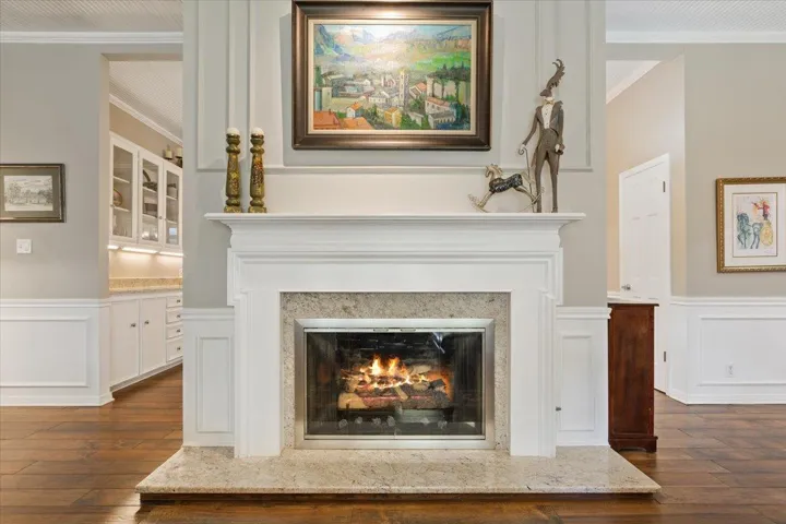 Feature your favorite art work above the fireplace with a built in spotlight to highlight it...