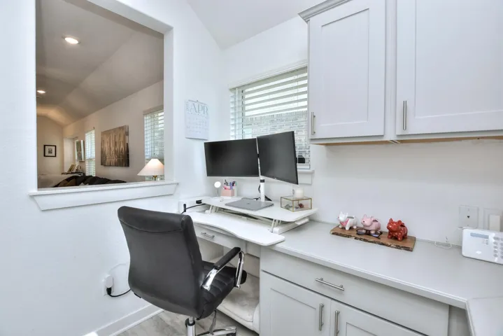 Office featuring recessed lighting and lofted ceiling