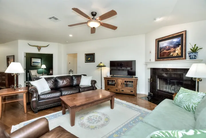 As you can see, the fireplace is the centerpiece of this room..but when you see the views out the rear windows, you might just focus on that!