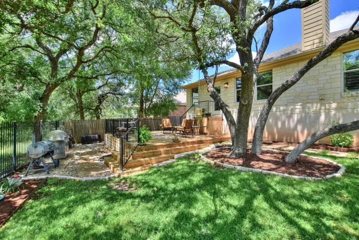 Now you can see the grilling area that was added to the backyard...lined with river rock.  Enjoy your view while you grill!