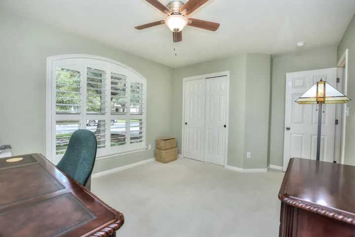 Let's go back to the front entry for a minute.  There are 2 bedrooms & a shared bathroom on a hallway located just to the right of the front door.  This is the front bedroom...