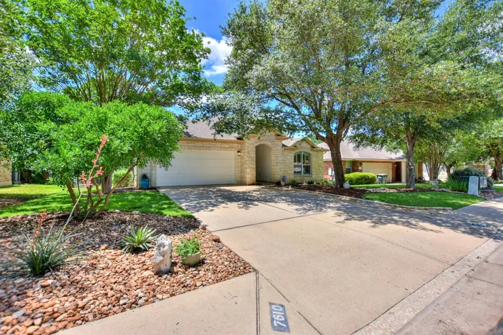 Every detail is impeccable.  River rock beds in the front yard give it so much personality...