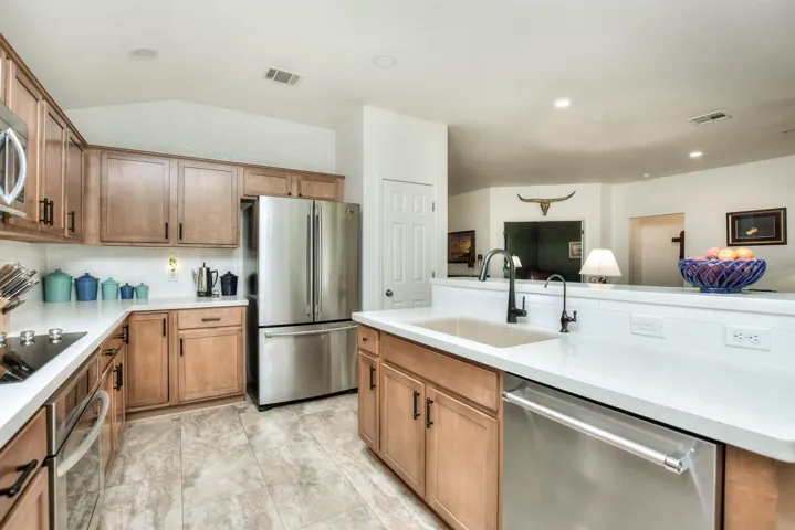 Dishwasher & stovetop were replaced with JennAir stainless appliances 2024.  Countertops were also replaced and are now Quartz counters!