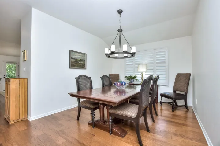 The formal dining area can easily seat 10.  Easy serving from the kitchen.
