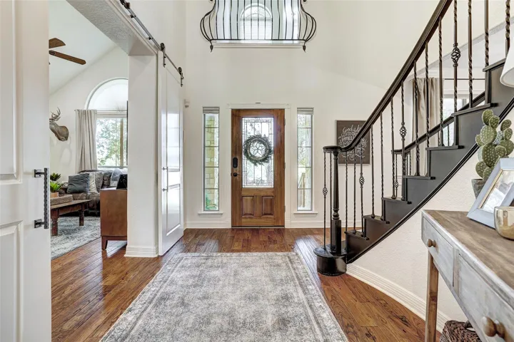 Stunning entry with hardwood floors