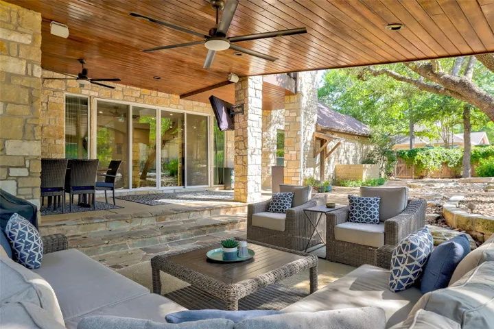 View of outdoor dining space looking towards the living room sliding glass doors