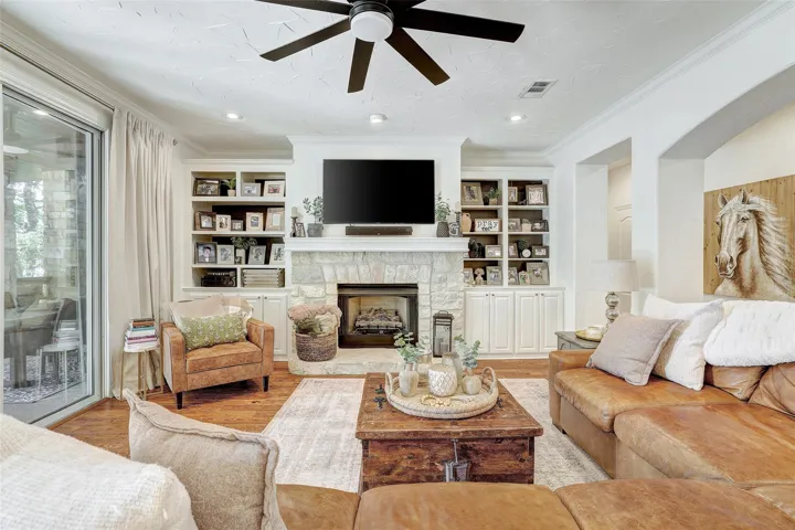Family Room with stone fireplace and built-ins