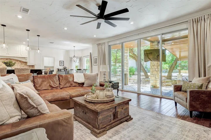 Cozy main level family room with view of outdoor living space