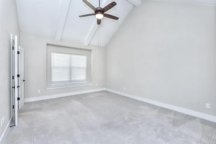 Primary Bedroom with lots of space and vaulted ceilings