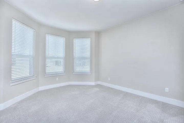 Front bedroom with lots of windows