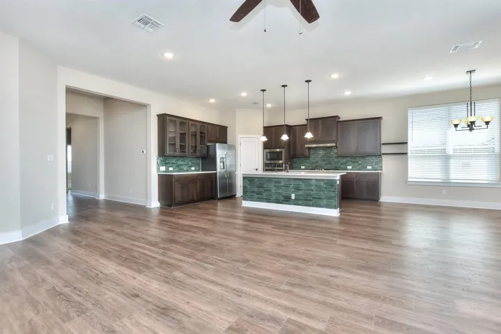 Kitchen with light countertops