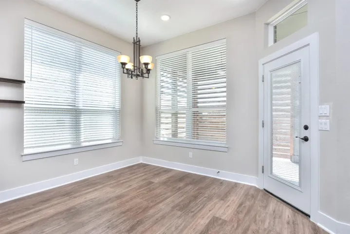 Dining area with a chandelier