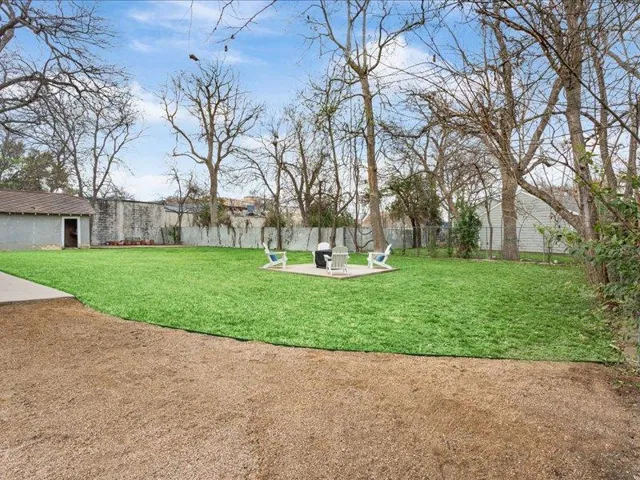 Fenced backyard featuring a patio area