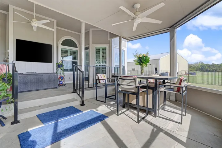 Beautiful Spacious Sun room ;  this photos shows the workshop and water storage tanks