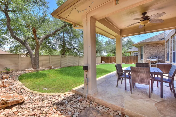 Lovely private back yard with mature live oaks, no neighbors behind and the HOA maintains the back fence.