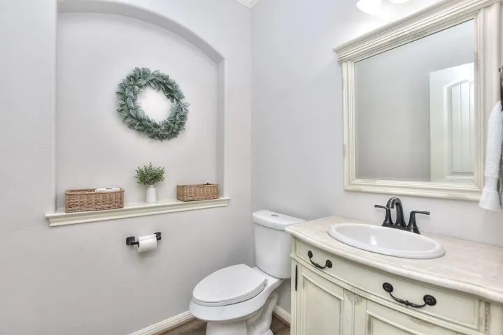 Powder room for guests is at the first floor entry.