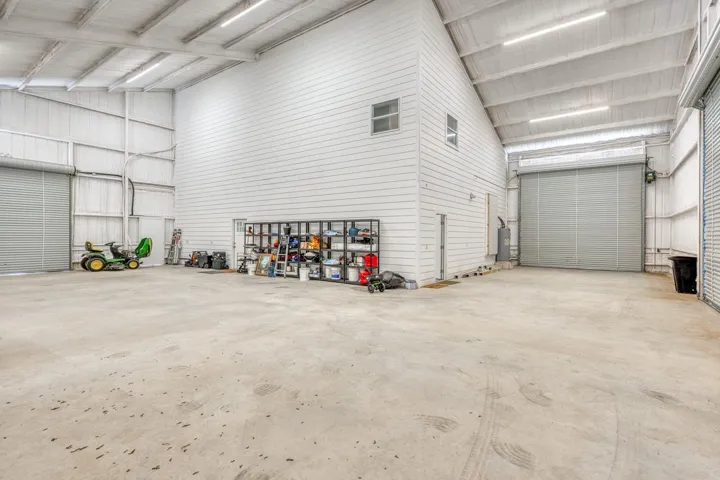This view shows 2 of the exterior shop doors;  RV plugs and cleanout