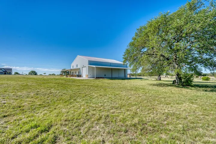 This is the backyard view;  16' covered back porch/patio