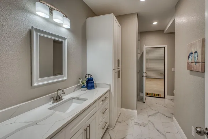 3 full bath; quartz throughout; frameless showers in all; 2 full baths on main level; 2 full bath upstairs