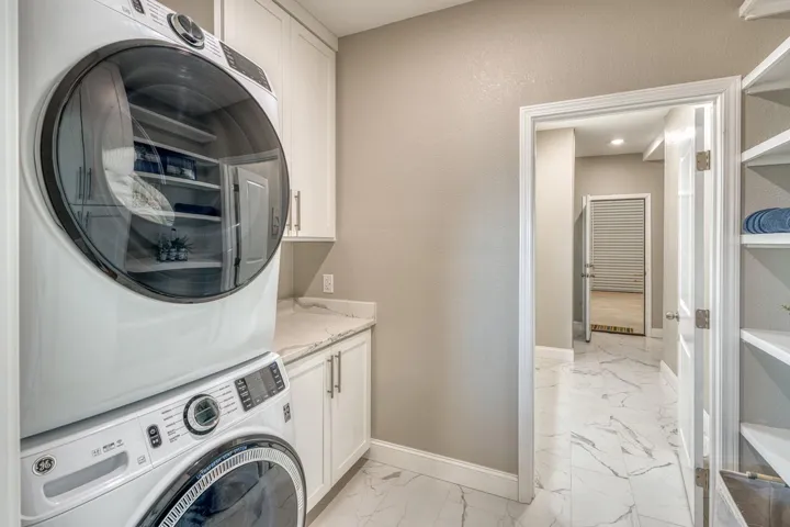 Great cabinets and folding space; built in shelving