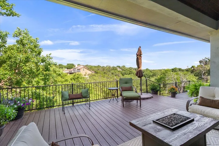 Wooden deck with a fire pit and one super amazing view of peace & transquility...