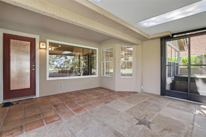 A private outdoor space with durable tile flooring provides an ideal setting for relaxation.