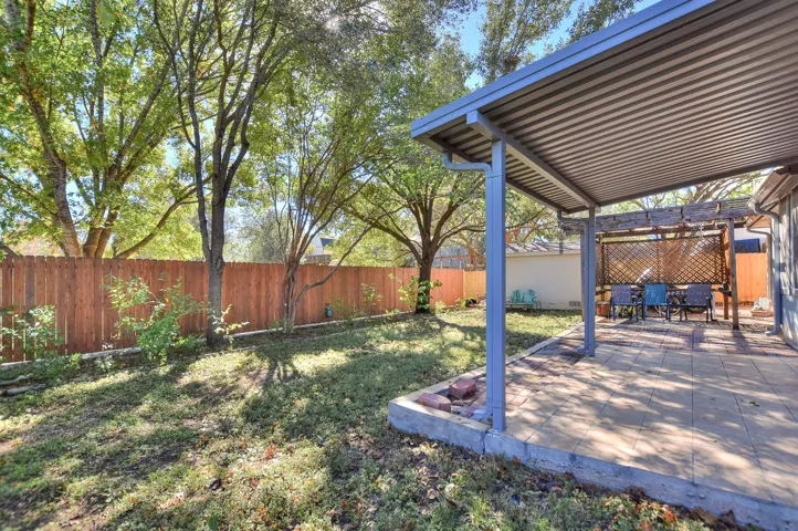 Nice yard with mature trees and bedding areas.