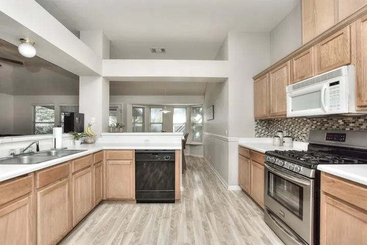 Note the architectural features that allow a unique openness to this kitchen!