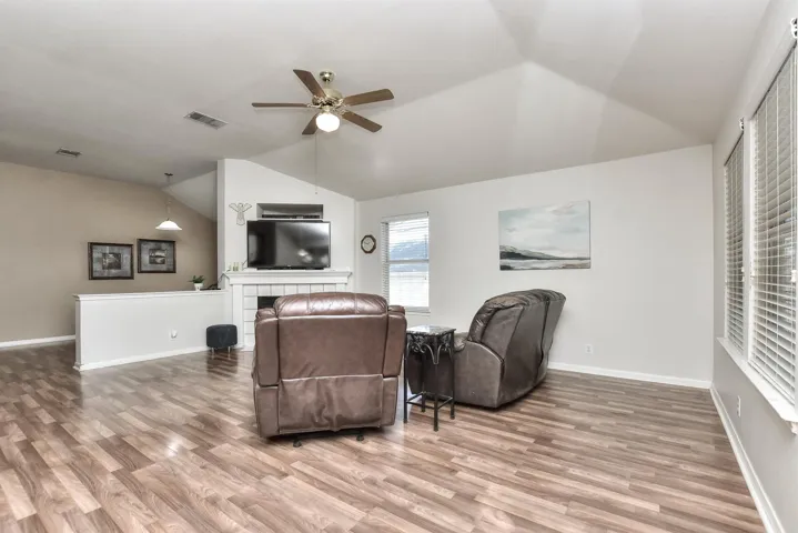 Huge family room is open off the kitchen and "formal" dining room/flex space.