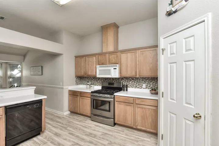 Newer gas range and walk-in pantry.