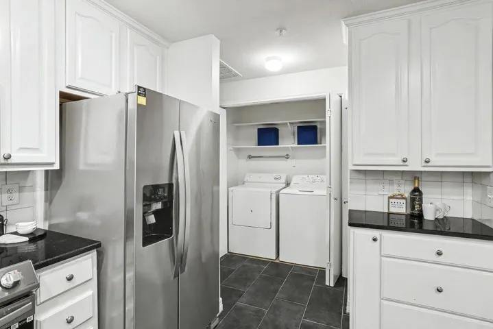 Stainless steel appliances and ample cabinet space make this kitchen functional.