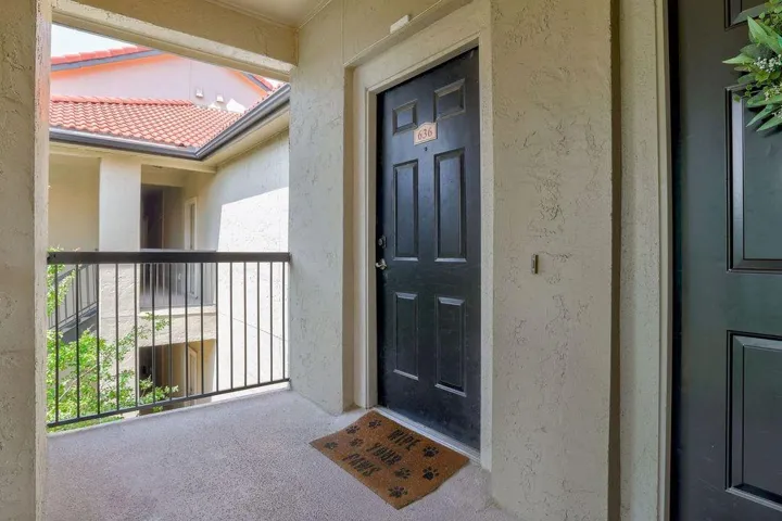 Enter this inviting residence from a covered patio offering refreshing views of the community.