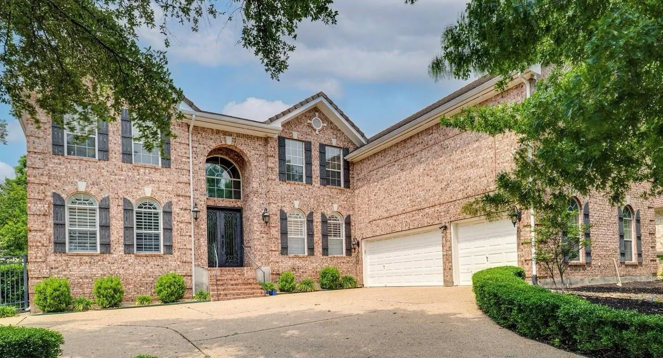 Photo of 14 TORRINGTON LN, The Hills, TX, 78738
