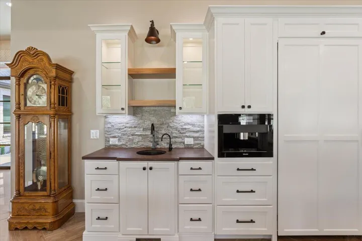 The Sellers thought of everything.  This is a sink & countertop with a Whole Bean Plumped Built-In Coffee System.. Countertop is Walnut Butcher Block...