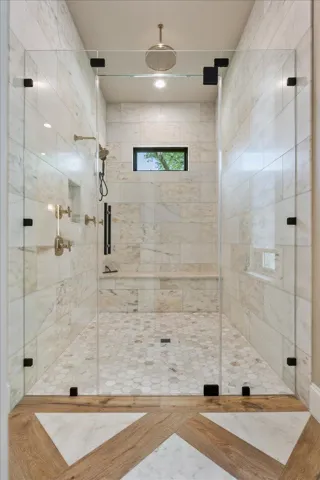 Walk-in Shower  with soap insert, bench, & window for natural light...